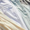 avocadogreenmattressorganiccottonsheetsnatural 800x.webp