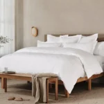 sp25 eecom heirloomsateenjaquardduvet alpinewhite a 054 d6916413 7c85 433d 9de1 c1c0bdd49ec4.webp