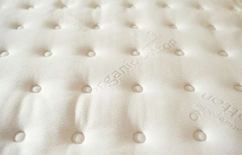 quartet concerto mattress naturepedic closeup2 0f1b7484 af8b 4984 9b6d 42dfe8c26ef5.jpeg